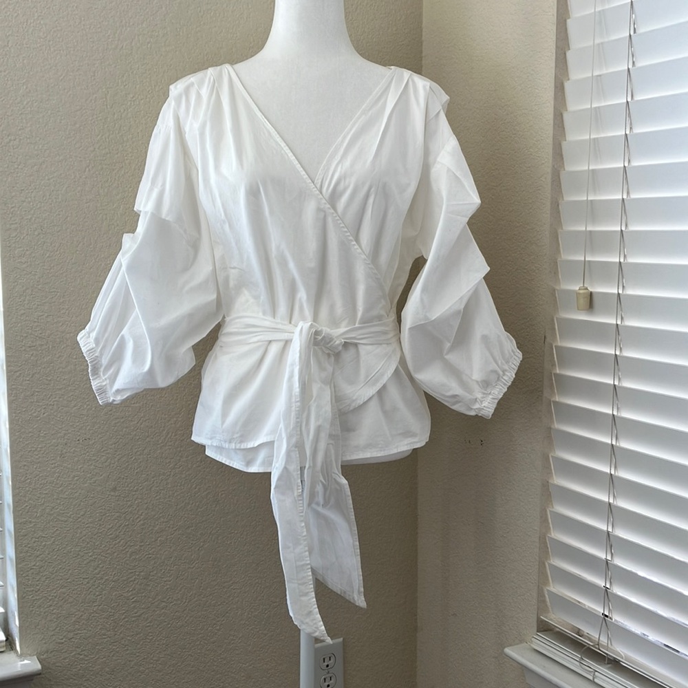 Guest Editor white blouse